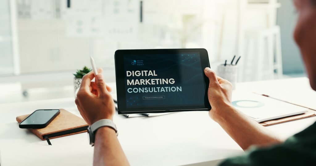 Business person, hands and tablet screen for marketing, advertising or promotion at creative startu
